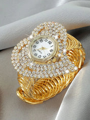 Women's gold diamond wristwatch, luxury brand design with rhinestone bracelet.