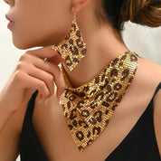 Leopard sequin print jewelry set for women, featuring a triangular scarf-style necklace and statement earrings with an exaggerated clavicle chain design