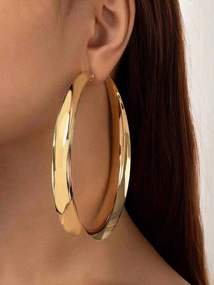 Pair of oversized trendy earrings with a luxurious, elegant, and high-quality design for women