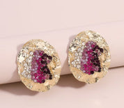 Gold earrings with rhinestones