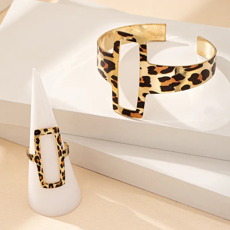 2-Piece Set – Bohemian Metallic Hollow Floral & Geometric Bracelet and Ring for Women