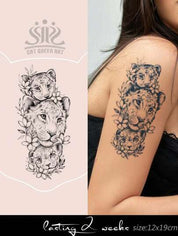 Beautiful temporary tattoo of a lion family with flowers. Elegant and detailed design. Perfect for showcasing a unique look. – Easy to apply and remove.